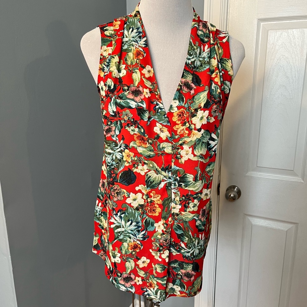 Red floral sleeveless blouse